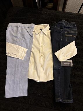Nautica Boys White Dress Shirt with Light Blue Nautica Pants and Dark Blue Jeans